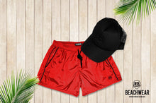 mens red swimming shorts bundle with black hat 